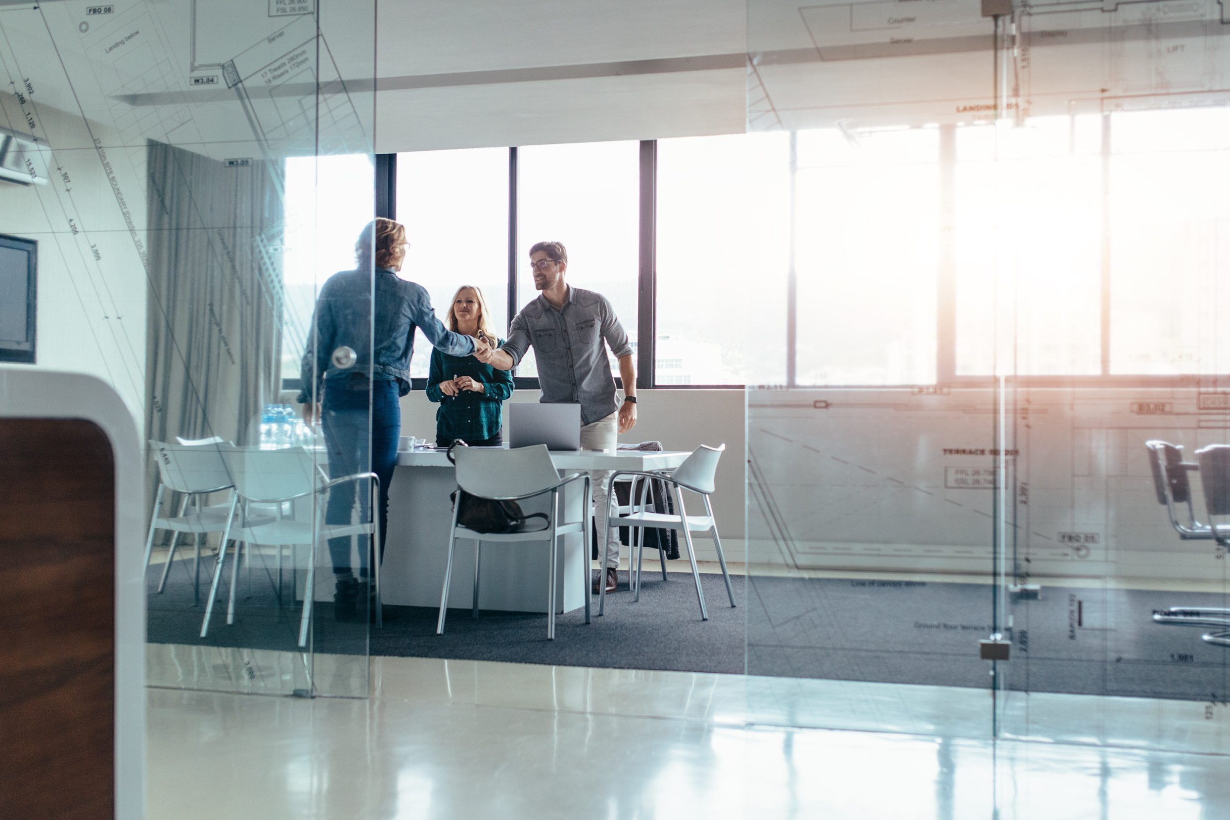 Businesspeople,Shaking,Hands,After,Meeting,In,Board,Room.,Businessman,Shaking